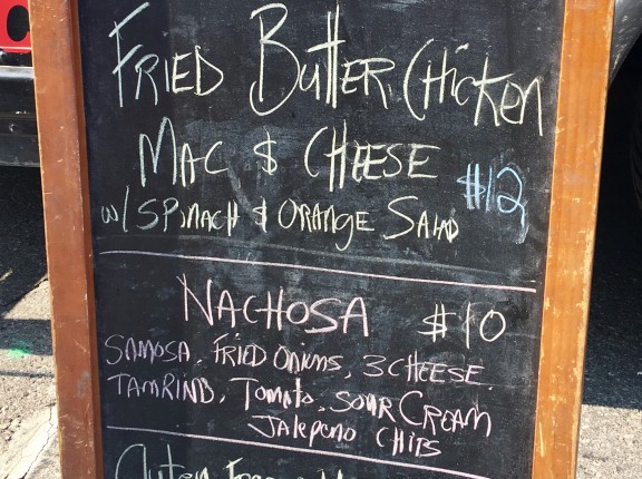 tdots naansense food truck sign butter chicken mac and cheese nachosa